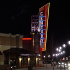 The Century sign at night