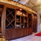 A wine rack outside of the Lobby